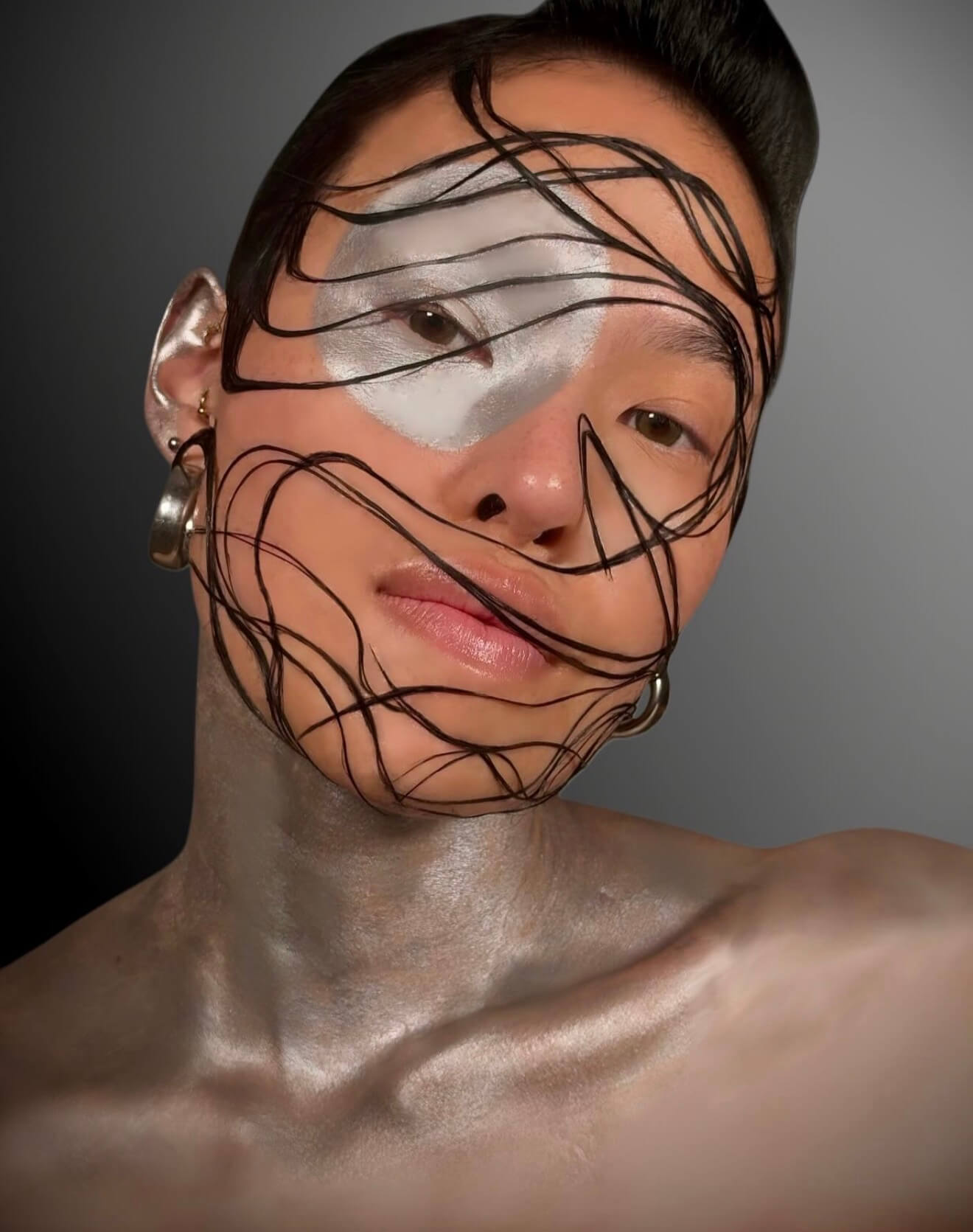 Silver and black abstract makeup portrait